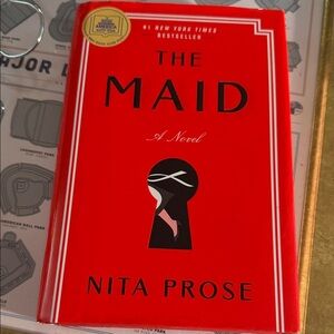 The Maid Novel by Nita Prose - Red Cover